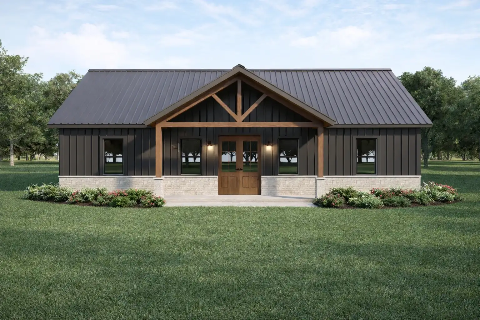 Rendering of the Coyote barndominium: dark board and batten exterior, standing seam metal roof and a timber framed entry porch over stone wainscot