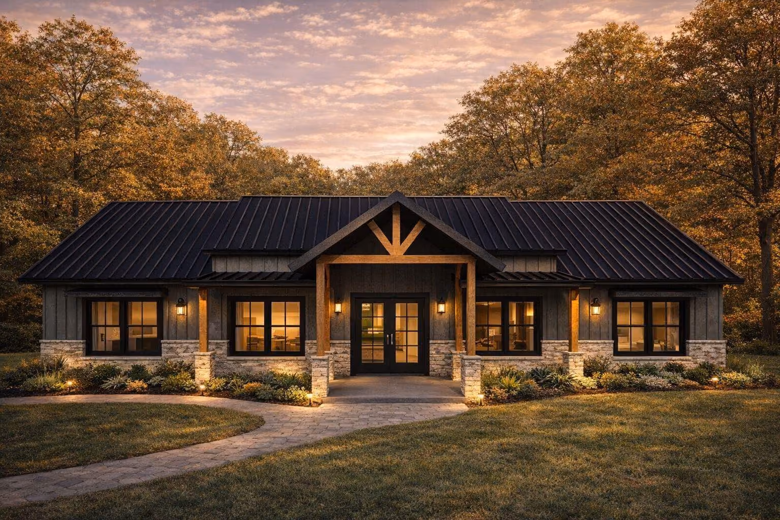 Rendering of the Jaguar barndominium at dusk: black metal roof, timber truss entry and stone column bases