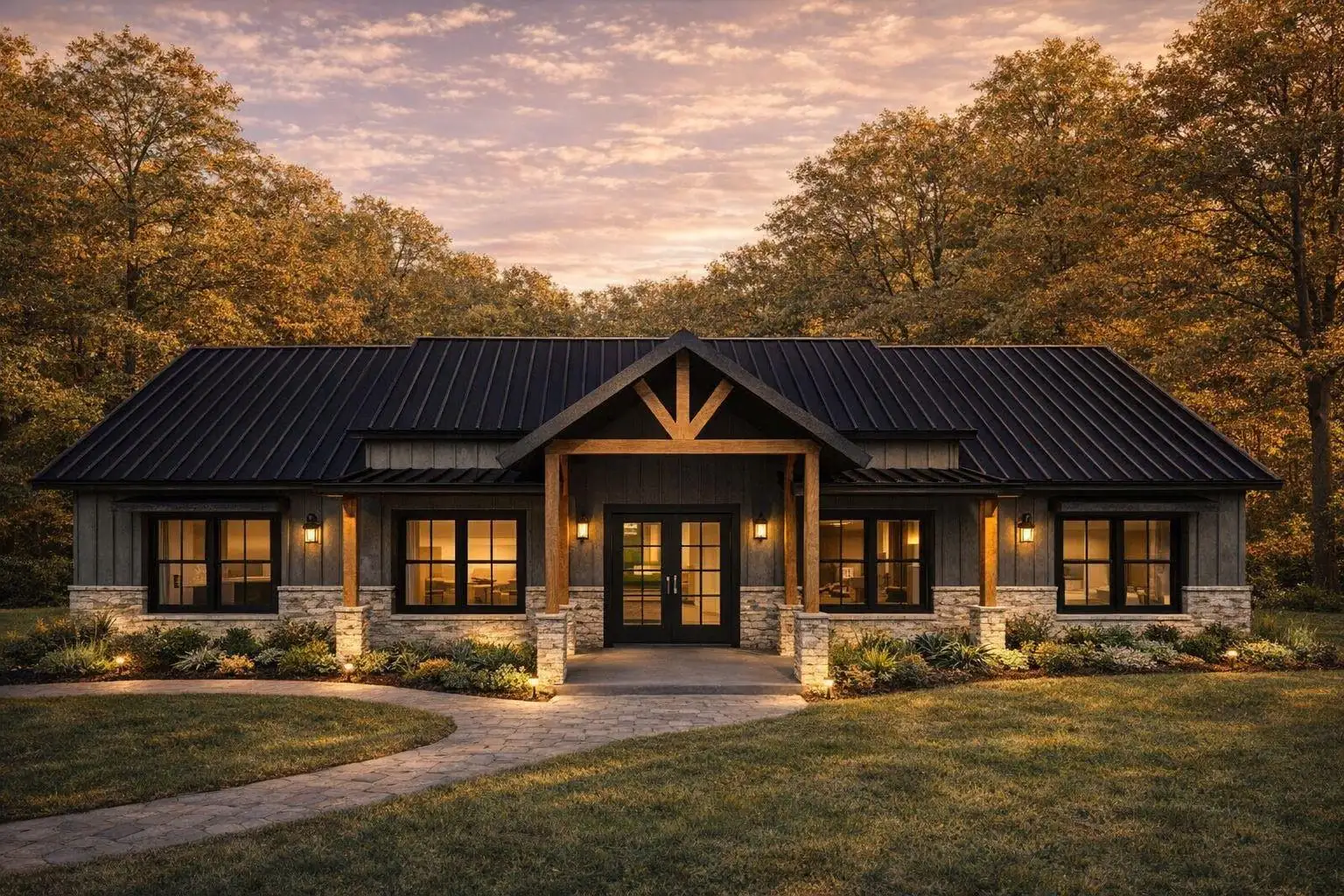 Rendering of the Jaguar barndominium at dusk: black metal roof, timber truss entry and stone column bases