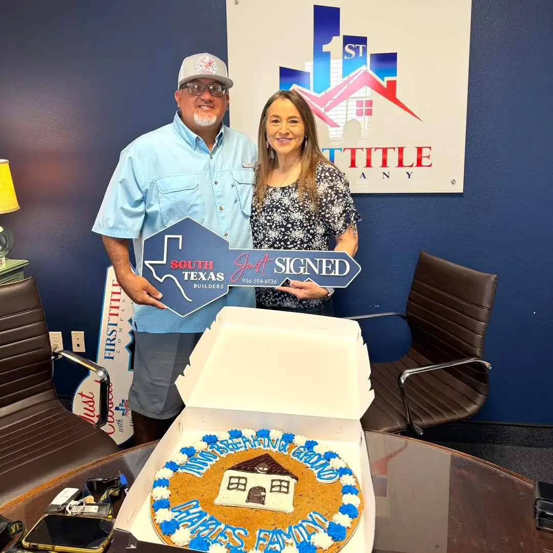 The Charles family on closing day at the title office