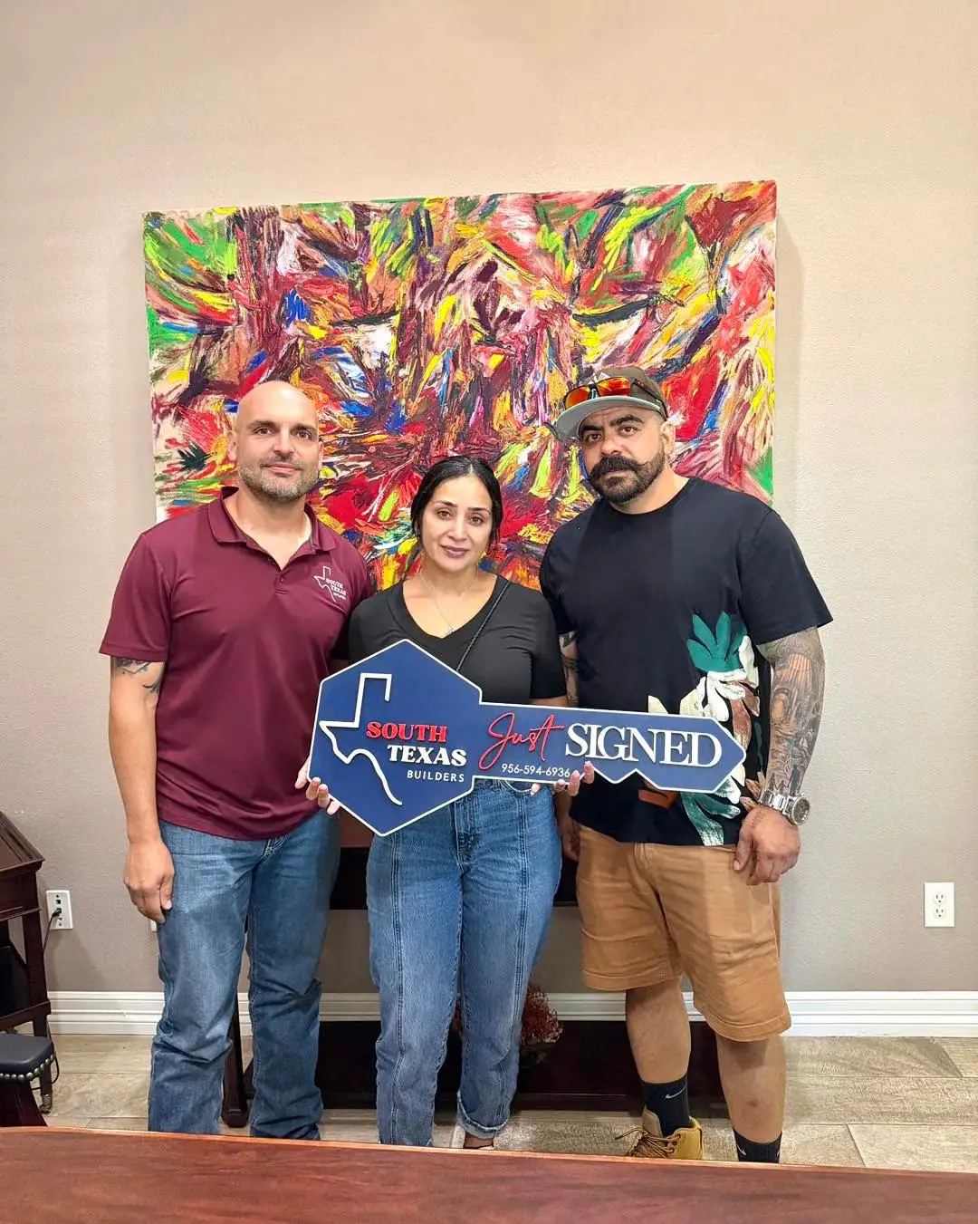 The Pulido family with their advisor on signing day