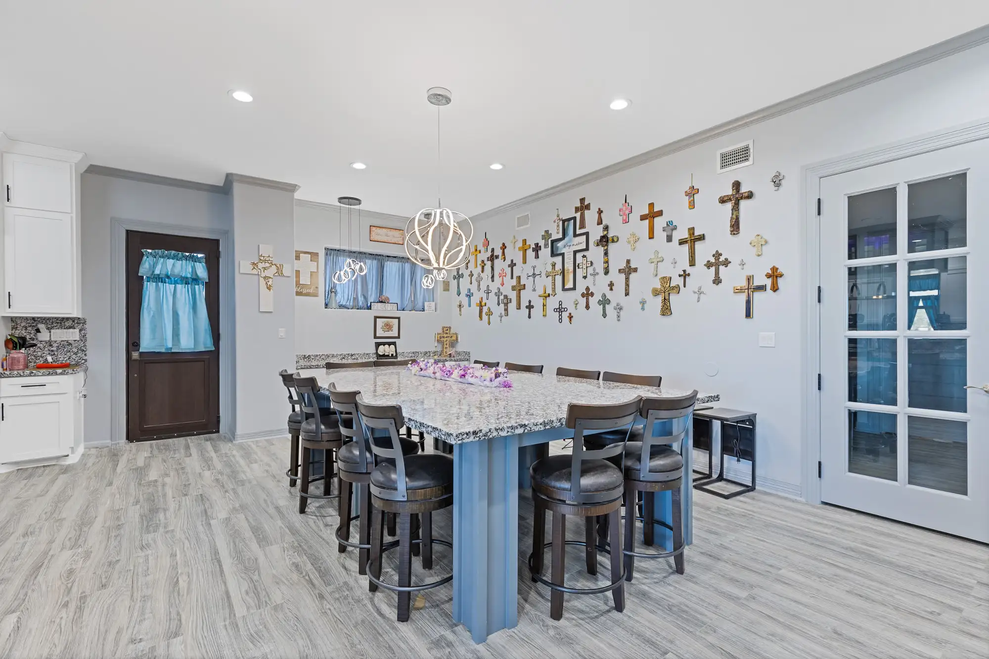 Counter-height dining table for eight beside the window wall