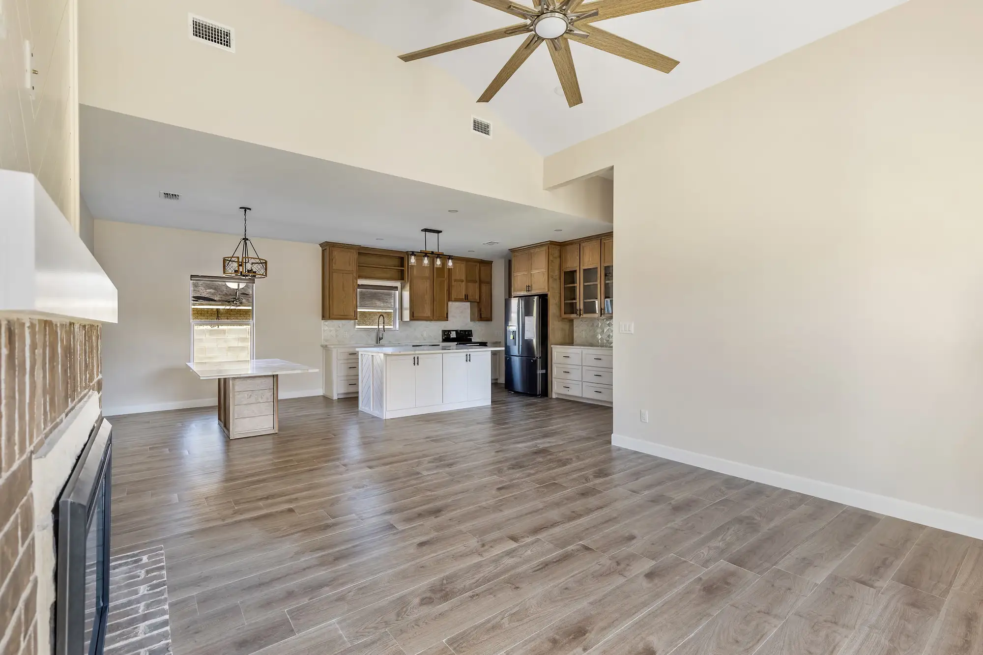 Kitchen and living open to each other under the gable